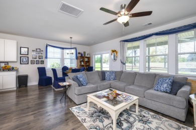 This beautiful 3 bedroom 2 and a half bath home is located in on Players Course At Wyboo Plantation in South Carolina - for sale on GolfHomes.com, golf home, golf lot