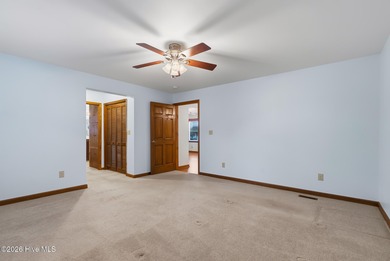 Exceptional Waterfront Retreat in beautiful Lake Royale! This on River Golf and Country Club at Lake Royale in North Carolina - for sale on GolfHomes.com, golf home, golf lot