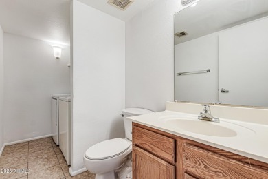 Welcome home to this charming 2-bedroom, 1.5-bath townhome on Raven Golf Club At South Mountain in Arizona - for sale on GolfHomes.com, golf home, golf lot