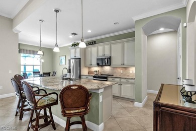 This exquisite home is situated in the award-winning Pelican on Pelican Preserve Golf Club in Florida - for sale on GolfHomes.com, golf home, golf lot