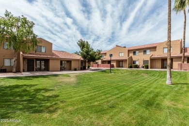 Welcome home to this charming 2-bedroom, 1.5-bath townhome on Raven Golf Club At South Mountain in Arizona - for sale on GolfHomes.com, golf home, golf lot