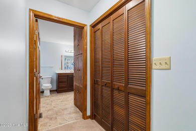 Exceptional Waterfront Retreat in beautiful Lake Royale! This on River Golf and Country Club at Lake Royale in North Carolina - for sale on GolfHomes.com, golf home, golf lot