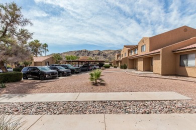 Welcome home to this charming 2-bedroom, 1.5-bath townhome on Raven Golf Club At South Mountain in Arizona - for sale on GolfHomes.com, golf home, golf lot