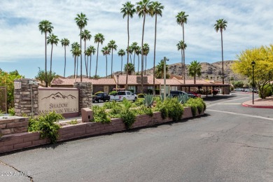 Welcome home to this charming 2-bedroom, 1.5-bath townhome on Raven Golf Club At South Mountain in Arizona - for sale on GolfHomes.com, golf home, golf lot