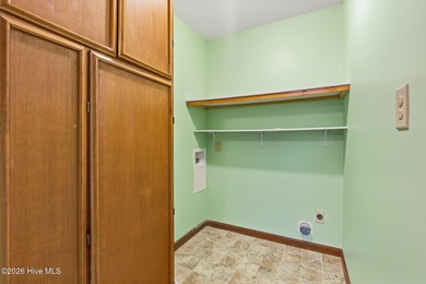 Exceptional Waterfront Retreat in beautiful Lake Royale! This on River Golf and Country Club at Lake Royale in North Carolina - for sale on GolfHomes.com, golf home, golf lot