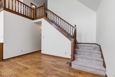 Exceptional Waterfront Retreat in beautiful Lake Royale! This on River Golf and Country Club at Lake Royale in North Carolina - for sale on GolfHomes.com, golf home, golf lot