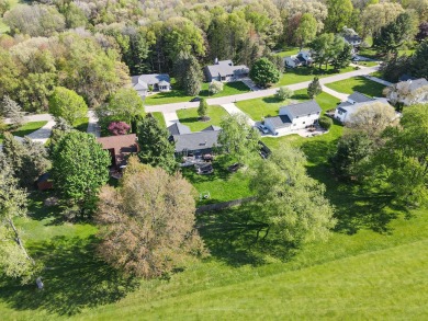 Welcome to this well maintained Plainwell Schools ranch! Sitting on Lake Doster Golf Club in Michigan - for sale on GolfHomes.com, golf home, golf lot