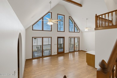 Exceptional Waterfront Retreat in beautiful Lake Royale! This on River Golf and Country Club at Lake Royale in North Carolina - for sale on GolfHomes.com, golf home, golf lot