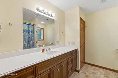 Exceptional Waterfront Retreat in beautiful Lake Royale! This on River Golf and Country Club at Lake Royale in North Carolina - for sale on GolfHomes.com, golf home, golf lot