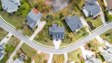 Charming elevated Lowcountry home, situated on generously sized on Charleston National Golf Club in South Carolina - for sale on GolfHomes.com, golf home, golf lot