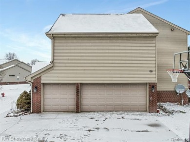 Nestled in the heart of Commerce Township, this grand 4-bedroom on Union Lake Golf Course in Michigan - for sale on GolfHomes.com, golf home, golf lot