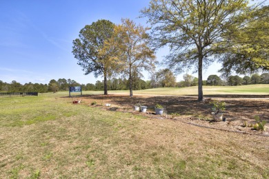 This beautiful 3 bedroom 2 and a half bath home is located in on Players Course At Wyboo Plantation in South Carolina - for sale on GolfHomes.com, golf home, golf lot