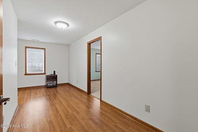 Exceptional Waterfront Retreat in beautiful Lake Royale! This on River Golf and Country Club at Lake Royale in North Carolina - for sale on GolfHomes.com, golf home, golf lot