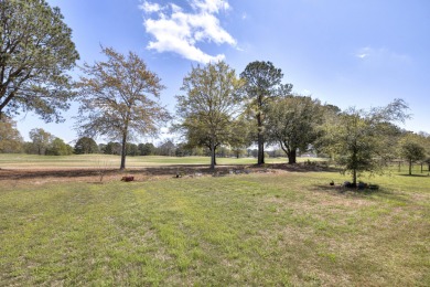 This beautiful 3 bedroom 2 and a half bath home is located in on Players Course At Wyboo Plantation in South Carolina - for sale on GolfHomes.com, golf home, golf lot