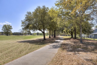 This beautiful 3 bedroom 2 and a half bath home is located in on Players Course At Wyboo Plantation in South Carolina - for sale on GolfHomes.com, golf home, golf lot