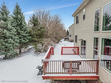 Nestled in the heart of Commerce Township, this grand 4-bedroom on Union Lake Golf Course in Michigan - for sale on GolfHomes.com, golf home, golf lot