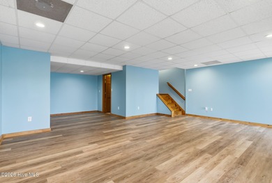 Exceptional Waterfront Retreat in beautiful Lake Royale! This on River Golf and Country Club at Lake Royale in North Carolina - for sale on GolfHomes.com, golf home, golf lot