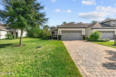 Beautiful Arbour II Villa features a Dining/Living room on Plantation Bay Golf and Country Club in Florida - for sale on GolfHomes.com, golf home, golf lot