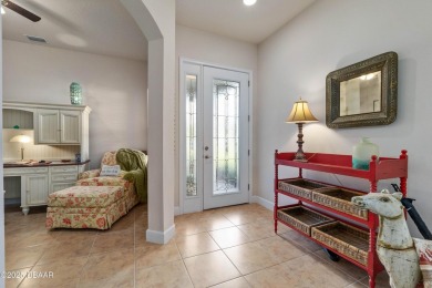 Beautiful Arbour II Villa features a Dining/Living room on Plantation Bay Golf and Country Club in Florida - for sale on GolfHomes.com, golf home, golf lot
