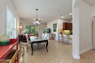 Beautiful Arbour II Villa features a Dining/Living room on Plantation Bay Golf and Country Club in Florida - for sale on GolfHomes.com, golf home, golf lot