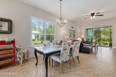 Beautiful Arbour II Villa features a Dining/Living room on Plantation Bay Golf and Country Club in Florida - for sale on GolfHomes.com, golf home, golf lot