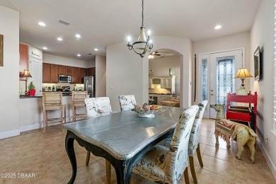 Beautiful Arbour II Villa features a Dining/Living room on Plantation Bay Golf and Country Club in Florida - for sale on GolfHomes.com, golf home, golf lot