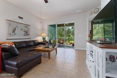Beautiful Arbour II Villa features a Dining/Living room on Plantation Bay Golf and Country Club in Florida - for sale on GolfHomes.com, golf home, golf lot