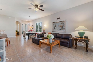 Beautiful Arbour II Villa features a Dining/Living room on Plantation Bay Golf and Country Club in Florida - for sale on GolfHomes.com, golf home, golf lot