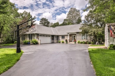 This gorgeous Timber Ridge home sits on 1.24 acres with a wooded on Timber Ridge Golf Club in Wisconsin - for sale on GolfHomes.com, golf home, golf lot