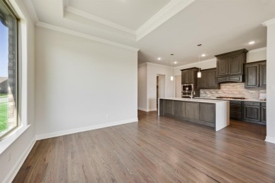 This popular single story Altura Birch floorplan is now on Heath Golf and Yacht Club in Texas - for sale on GolfHomes.com, golf home, golf lot