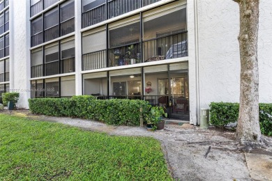 Enjoy the scenic garden view in this beautifully updated on Inverrary Country Club in Florida - for sale on GolfHomes.com, golf home, golf lot