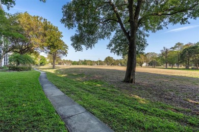 Enjoy the scenic garden view in this beautifully updated on Inverrary Country Club in Florida - for sale on GolfHomes.com, golf home, golf lot