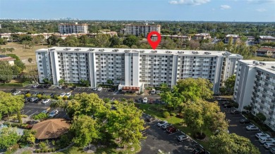 Enjoy the scenic garden view in this beautifully updated on Inverrary Country Club in Florida - for sale on GolfHomes.com, golf home, golf lot