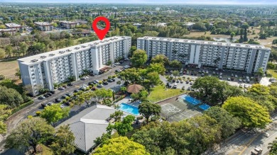 Enjoy the scenic garden view in this beautifully updated on Inverrary Country Club in Florida - for sale on GolfHomes.com, golf home, golf lot
