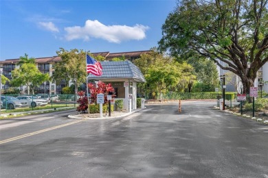 Enjoy the scenic garden view in this beautifully updated on Inverrary Country Club in Florida - for sale on GolfHomes.com, golf home, golf lot