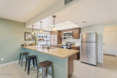Discover your dream home nestled against the 17th tee of a on Ahwatukee Country Club in Arizona - for sale on GolfHomes.com, golf home, golf lot