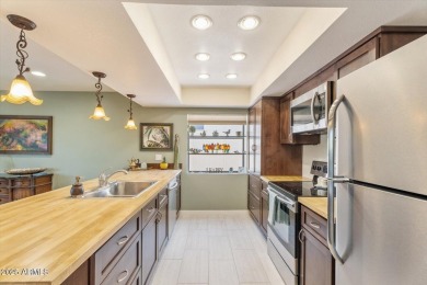 Discover your dream home nestled against the 17th tee of a on Ahwatukee Country Club in Arizona - for sale on GolfHomes.com, golf home, golf lot