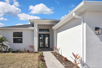 Come view this gorgeous brand-new home nestled feet away from on Burnt Store Golf Club in Florida - for sale on GolfHomes.com, golf home, golf lot