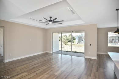 Come view this gorgeous brand-new home nestled feet away from on Burnt Store Golf Club in Florida - for sale on GolfHomes.com, golf home, golf lot