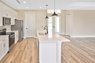 Come view this gorgeous brand-new home nestled feet away from on Burnt Store Golf Club in Florida - for sale on GolfHomes.com, golf home, golf lot