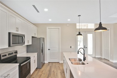 Come view this gorgeous brand-new home nestled feet away from on Burnt Store Golf Club in Florida - for sale on GolfHomes.com, golf home, golf lot