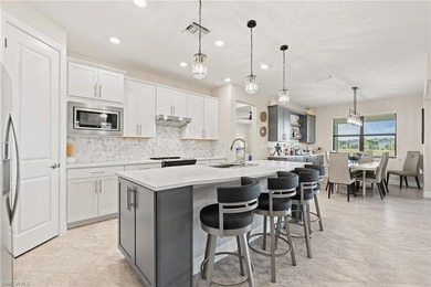 Step into this practically new luxury home in the prestigious on River Hall Country Club in Florida - for sale on GolfHomes.com, golf home, golf lot