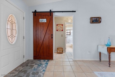 Beautiful home ideally situated 3 homes away from the community on Sabal Springs Golf and Racquet Club in Florida - for sale on GolfHomes.com, golf home, golf lot