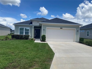 Step into modern comfort in this stunning 3-bedroom, 2-bathroom on Candler Hills Golf and Country Club in Florida - for sale on GolfHomes.com, golf home, golf lot