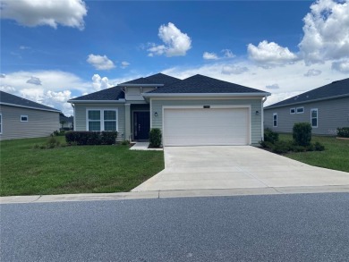 Step into modern comfort in this stunning 3-bedroom, 2-bathroom on Candler Hills Golf and Country Club in Florida - for sale on GolfHomes.com, golf home, golf lot
