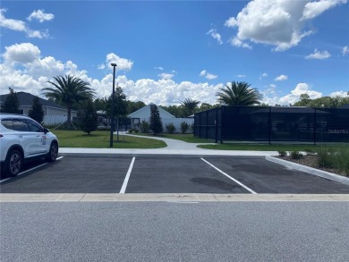 Step into modern comfort in this stunning 3-bedroom, 2-bathroom on Candler Hills Golf and Country Club in Florida - for sale on GolfHomes.com, golf home, golf lot