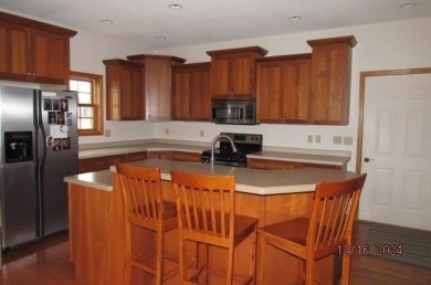 CROSSING MEADOWS ESTATE: Beautiful custom built 3 bedroom, 3 on Viroqua Hills Golf Club in Wisconsin - for sale on GolfHomes.com, golf home, golf lot