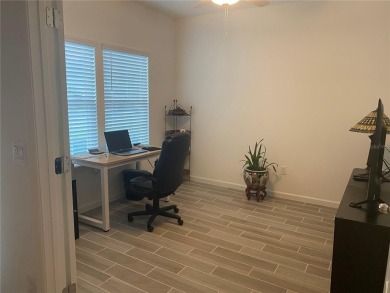 Step into modern comfort in this stunning 3-bedroom, 2-bathroom on Candler Hills Golf and Country Club in Florida - for sale on GolfHomes.com, golf home, golf lot