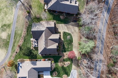 An exceptional all-brick custom residence, gracefully positioned on Heatherhurst Golf Course in Tennessee - for sale on GolfHomes.com, golf home, golf lot