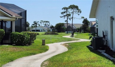 Beautiful home ideally situated 3 homes away from the community on Sabal Springs Golf and Racquet Club in Florida - for sale on GolfHomes.com, golf home, golf lot